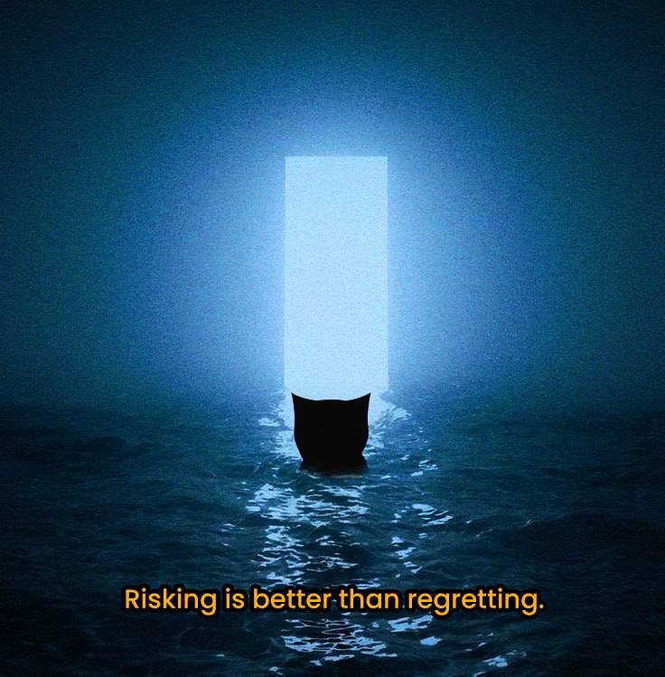 The cat swimming at night toward a glowing white portal standing in open ocean, captioned: Risking is better than regretting.